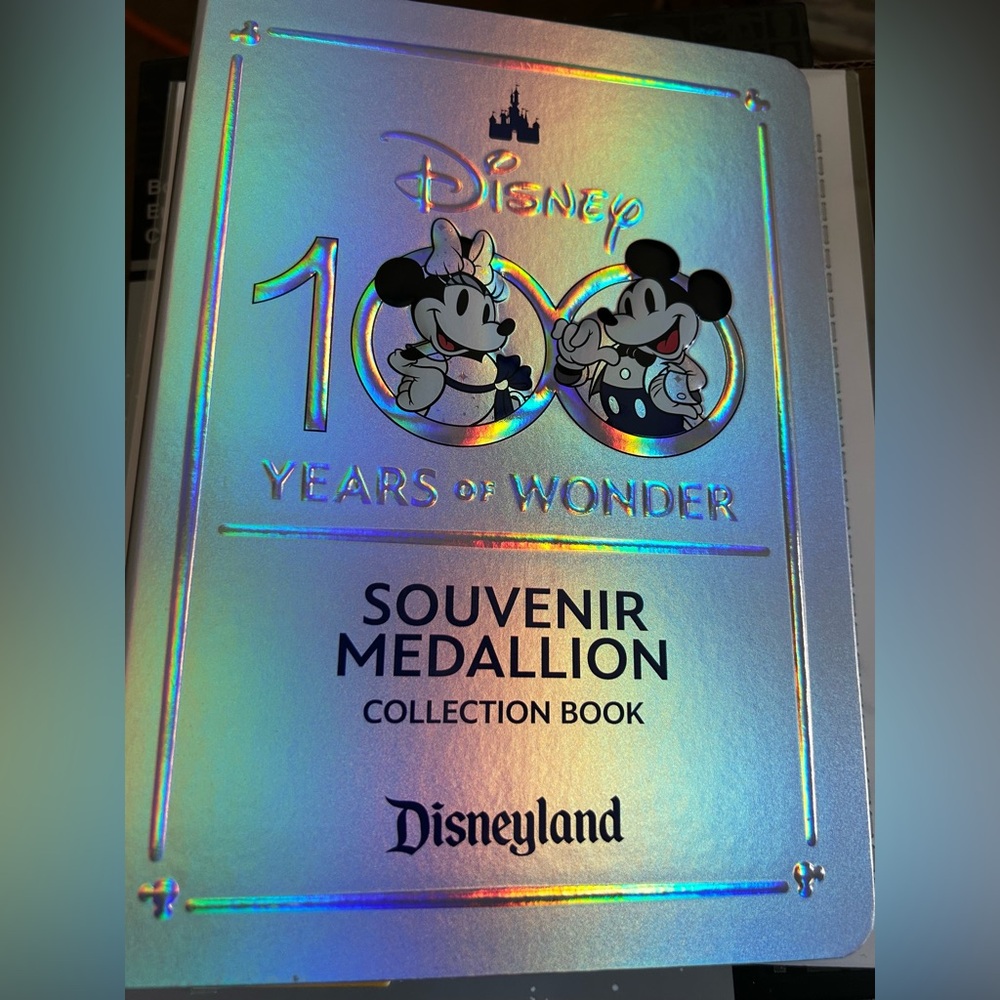 Disney Parks 100 Years Of Wonder Souvenir Medallion Coin Collector Book
